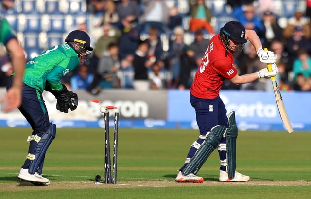 Cricket - Third Twenty20 International - Ireland v England - The Village, Malahide, Ireland - September 21, 2025 England's Jordan Cox is bowled out by Ireland's Ben White REUTERS/Cathal Mcnaughton