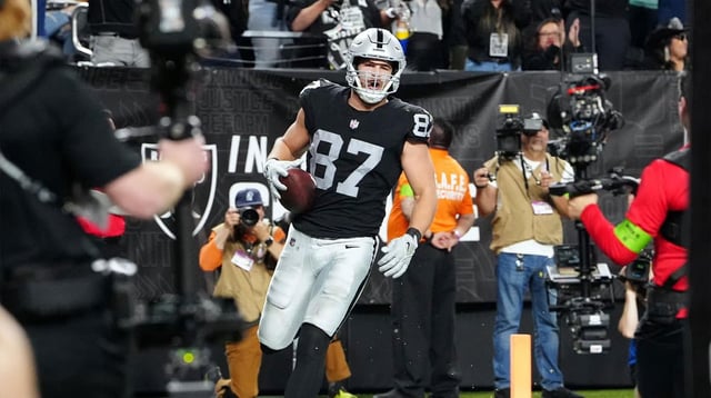 Dec 14, 2023; Paradise, Nevada, USA; Las Vegas Raiders tight end Michael Mayer (87) celebrates after scoring a touchdown in the second quarter against the Los Angeles Chargers at Allegiant Stadium. Mandatory Credit: Stephen R. Sylvanie-USA TODAY Sports