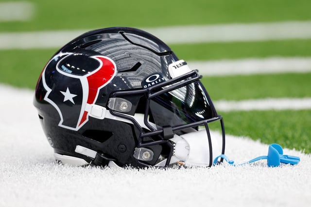 A Houston Texans helmet is seen on the turf before the game against the Tennessee Titans at NRG Stadium on November 24, 2024 in Houston, Texas.