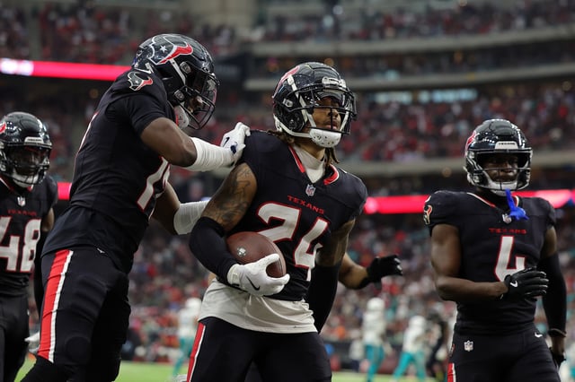 Derek Stingley Jr. #24 of the Houston Texans reacts after making an interception against the Miami Dolphins during the fourth quarter at NRG Stadium on December 15, 2024 in Houston, Texas.