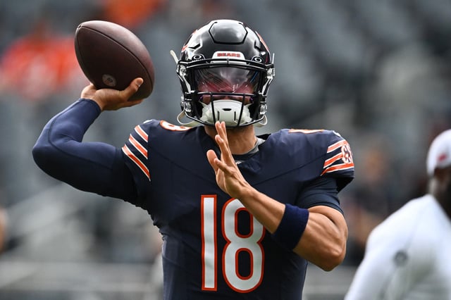 CHICAGO, ILLINOIS - AUGUST 17: Caleb Williams #18 of the Chicago Bears warms up before a preseason game against the Cincinnati Bengals at Soldier Field on August 17, 2024 in Chicago, Illinois. Caleb Williams is among the top rookies poised to standout in Week 1.