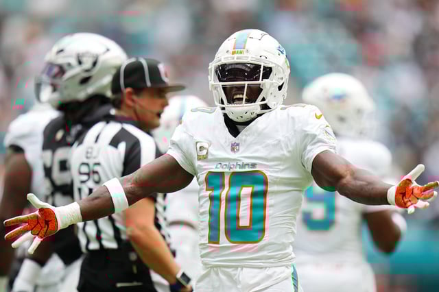 Tyreek Hill #10 of the Miami Dolphins reacts after a play in the first quarter of a game against the Las Vegas Raiders at Hard Rock Stadium on November 17, 2024 in Miami Gardens, Florida.