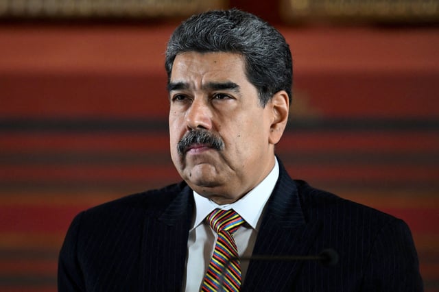 Venezuela's President Nicolas Maduro looks on during a meeting at the National Assembly in Caracas on August 22, 2025. Venezuela's President Nicolás Maduro on August 22, 2025, denounced the US military deployment in Caribbean waters as an "immoral, criminal, and illegal" plan against his country, seeking "regime change." (Photo by Juan BARRETO / AFP) (Photo by JUAN BARRETO/AFP via Getty Images)          