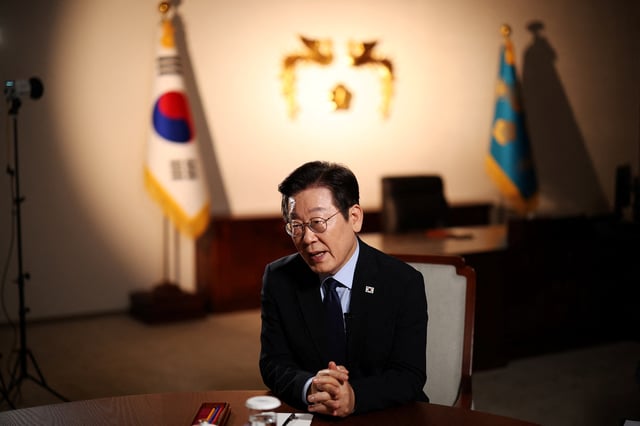 South Korean President Lee Jae Myung answers a reporter's question during an interview with Reuters at the Presidential Office in Seoul, South Korea, September 19, 2025.   REUTERS/Kim Hong-Ji