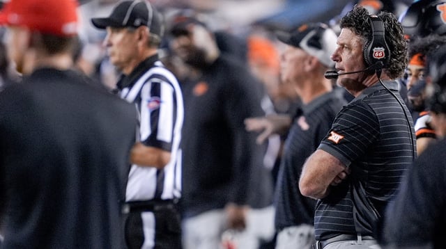 Oklahoma State head coach Mike Gundy stands on the sidelines in the third quarter during an NCAA football game between Oklahoma State (OSU) and Tulsa at Boone Pickens Stadium in Stillwater, Okla., on Friday, Sept. 19, 2025.