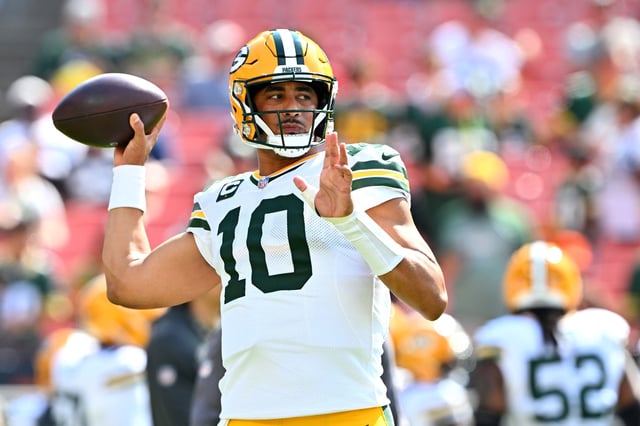 Jordan Love #10 of the Green Bay Packers warms up before the game against the Cleveland Browns at Huntington Bank Field on September 21, 2025 in Cleveland, Ohio.