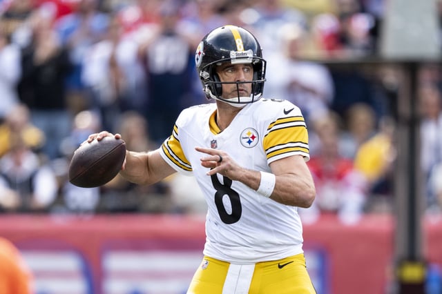 Aaron Rodgers #8 of the Pittsburgh Steelers looks to pass during an NFL football game against the New England Patriots at Gillette Stadium on September 21, 2025 in Foxborough, Massachusetts.