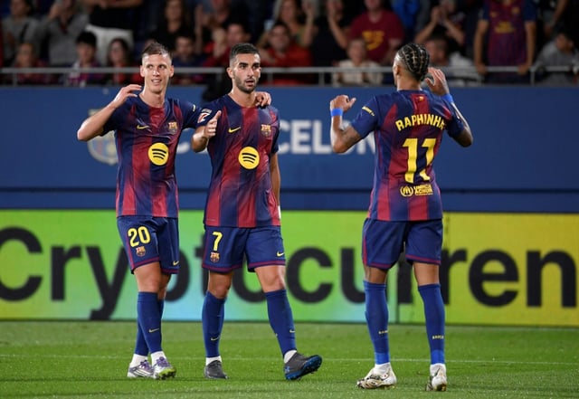 Barcelona's Spanish forward Ferran Torres (C) opened the scoring with a powerful finish at the end of a slick move