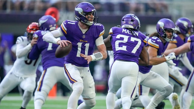 Minnesota Vikings quarterback Carson Wentz (11) scrambles to throw in the first quarter of the NFL Week 3 game between the Minnesota Vikings and the Cincinnati Bengals at U.S. Bank Stadium in Minneapolis on Sunday, Sept. 21, 2025.

Sam Greene/The Enquirer / USA TODAY NETWORK via Imagn Images