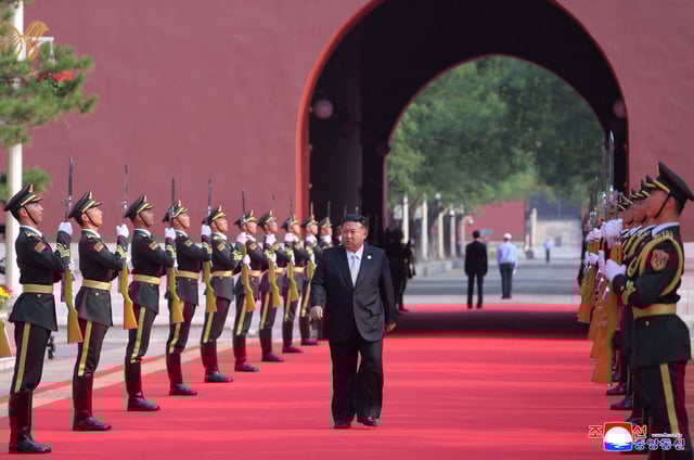 North Korean leader Kim Jong Un arrives for a military parade to mark the 80th anniversary of the end of World War Two, in Beijing, China, September 3, 2025, in this picture released by North Korea's official Korean Central News Agency.   KCNA via REUTERS/File Photo