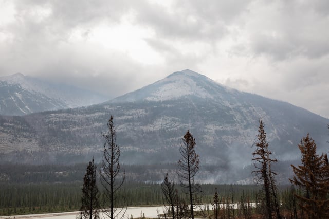 Campers can begin planning their return to Jasper National Park less than one year after a devastating wildfire swept through the area.A wildfire smoulders outside of Jasper, Alta., on Friday, Aug. 16, 2024. THE CANADIAN PRESS/Amber Bracken