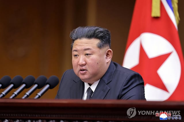 This photo, carried by North Korea's official Korean Central News Agency on Sept. 22, 2025, shows the North's leader Kim Jong-un delivering a speech at a key parliamentary meeting held the previous two days. (For Use Only in the Republic of Korea. No Redistribution) (Yonhap)