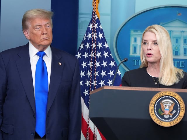 FILE - Attorney General Pam Bondi speaks to reporters as President Donald Trump listens, Friday, June 27, 2025, in the briefing room of the White House in Washington. (AP Photo/Jacquelyn Martin, File)