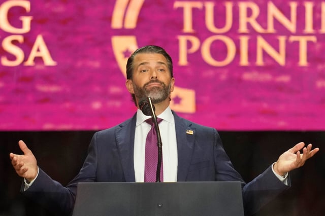 Donald Trump Jr. speaks at a memorial for conservative activist Charlie Kirk, Sunday, Sept. 21, 2025, at State Farm Stadium in Glendale, Ariz. (AP Photo/John Locher)