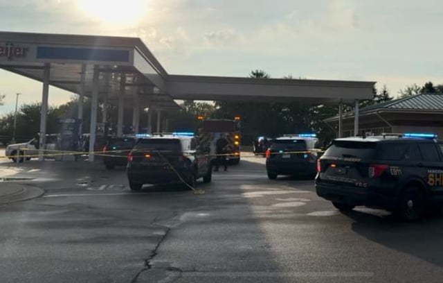 A woman died following a stabbing at a Meijer gas station in Shelby Township, with police confirming they have a male suspect in custody.