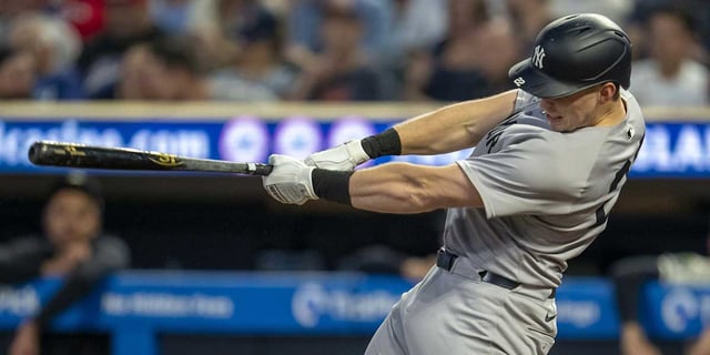Sep 16, 2025; Minneapolis, Minnesota, USA; New York Yankees first baseman Ben Rice (22) hits a RBI double against the Minnesota Twins in the third inning at Target Field. Mandatory Credit: Jesse Johnson-Imagn Images