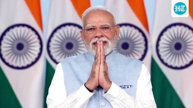 New Delhi, Sep 21 (ANI): Prime Minister Narendra Modi greets before addressing the nation, in New Delhi on Sunday. (DD/ANI Video Grab)
