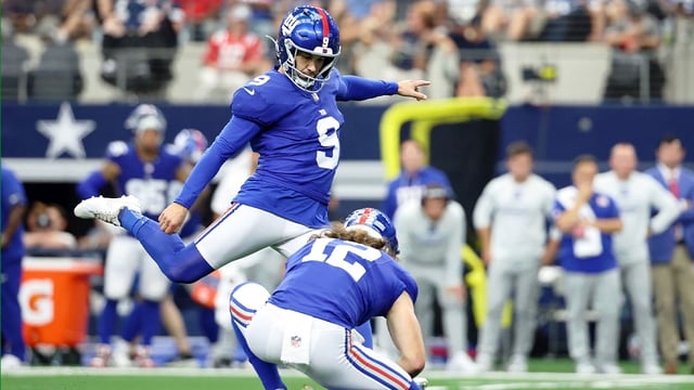 Sep 14, 2025; Arlington, Texas, USA; New York Giants place kicker Graham Gano (9) attempts a field goal against the Dallas Cowboys during the third quarter at AT&T Stadium. Mandatory Credit: Kevin Jairaj-Imagn Images