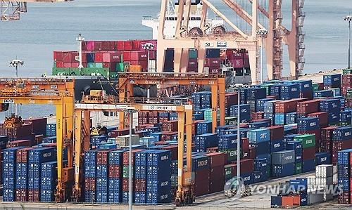 In this file photo, containers are stacked at a port in Pyeongtaek, south of Seoul, on Sept. 4, 2025. (Yonhap)