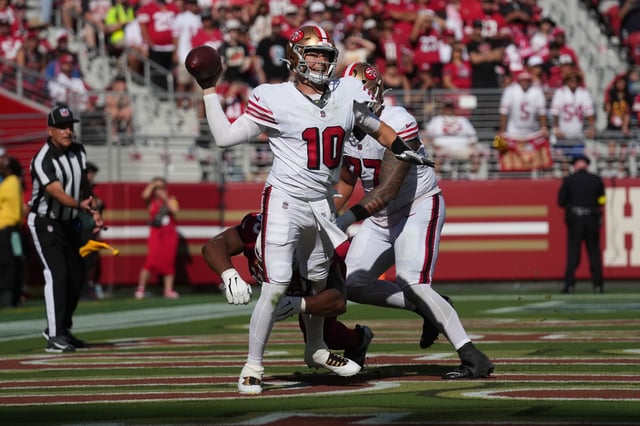 Sep 21, 2025; Santa Clara, California, USA; San Francisco 49ers quarterback Mac Jones (10) is sacked by Arizona Cardinals defensive end Calais Campbell (93) for a safety during the second half at Levi's Stadium. Mandatory Credit: Cary Edmondson-Imagn Images