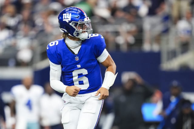 ARLINGTON, TX - SEPTEMBER 14: Jaxson Dart #6 of the New York Giants looks on from the field during an NFL football game against the Dallas Cowboys at AT&T Field on September 14, 2025 in Arlington, Texas. (Photo by Cooper Neill/Getty Images)