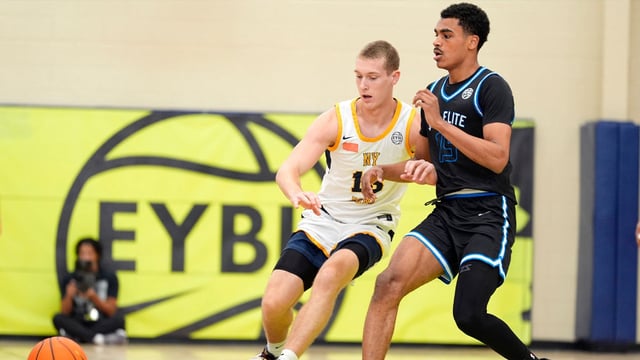 July 15, 2025; North Augusta, South Carolina, USA; NY Rens Gabriel Hornberger (13) and JL3 Abdul Aziz Olajuwon (15) battle for the ball during the NY Rens and JL3 game at Nike EYBL Peach Jam at Riverview Park Activities Center. The NY Rens won 83-53. Mandatory Credit: Katie Goodale - Augusta Chronicle/USA TODAY NETWORK