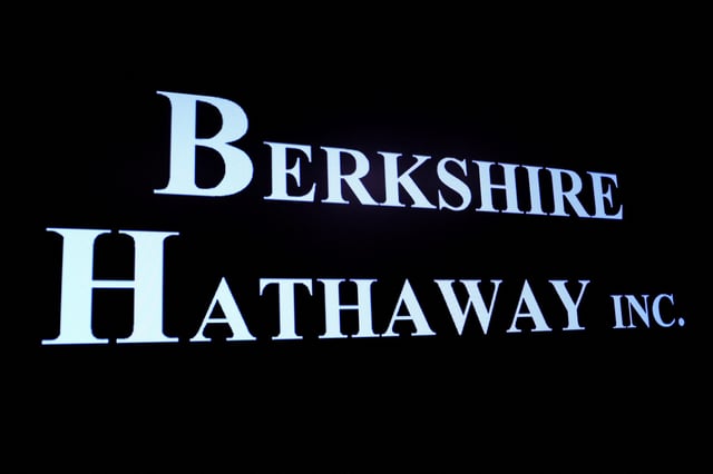 Berkshire Hathaway logo is displayed on a screen on the floor of the New York Stock Exchange (NYSE) in New York City, U.S., May 10, 2023.  REUTERS/Brendan McDermid/File Photo