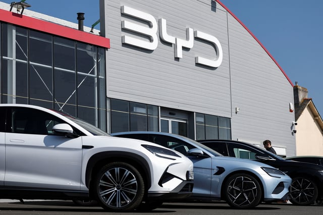 The logo of BYD is pictured at a dealership in Reze near Nantes, France, March 27, 2025. REUTERS/Stephane Mahe/File Photo