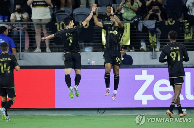 Son Heung-min of Los Angeles Football Club (2nd from L) celebrates with teammate Denis Bouanga (2nd from R) after scoring a goal against Real Salt Lake during the clubs' Major League Soccer match at BMO Stadium in Los Angeles on Sept. 21, 2025, in this Getty Images photo. (Yonhap)