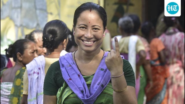 A woman in Baksa poses after casting her ballot during the Bodoland Territorial Council elections in Assam on Monday. (PTI)