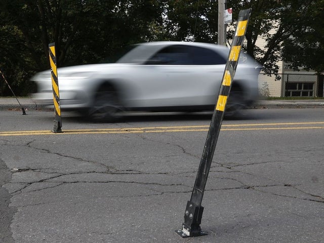  Traffic calming measures include flex posts (bollards) on the streets of Ottawa: One reader suggests they are a waste of money.