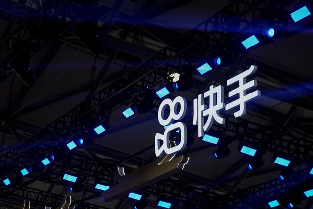 The logo of online video service operator Kuaishou Technology is seen at the China Digital Entertainment Expo and Conference, also known as ChinaJoy, in Shanghai, China July 30, 2021. REUTERS/Aly Song/File Photo
