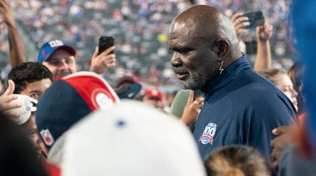 Lawrence Taylor is surrounded by fans Giants during Fan Fest at MetLife Stadium to celebrate 100 Seasons of the New York Giants, Friday, Sept. 6, 2024.