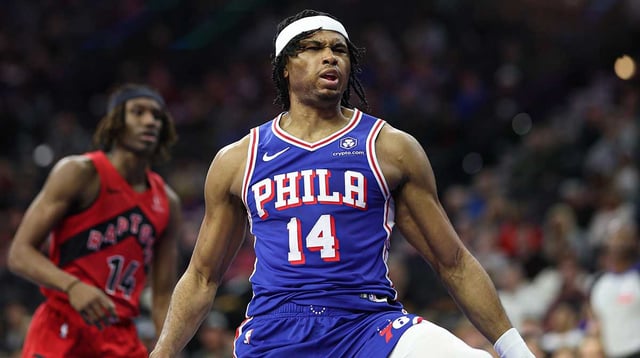 Mar 30, 2025; Philadelphia, Pennsylvania, USA; Philadelphia 76ers guard Ricky Council IV (14) reacts after dunking the ball against the Toronto Raptors during the second quarter at Wells Fargo Center. Mandatory Credit: Bill Streicher-Imagn Images