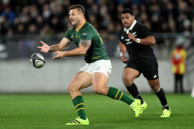 WELLINGTON, NEW ZEALAND - SEPTEMBER 13: Andre Esterhuizen of South Africa passes the ball during The Rugby Championship match between New Zealand All Blacks and South Africa Springboks at Sky Stadium on September 13, 2025 in Wellington, New Zealand. (Photo by Joe Allison/Getty Images)