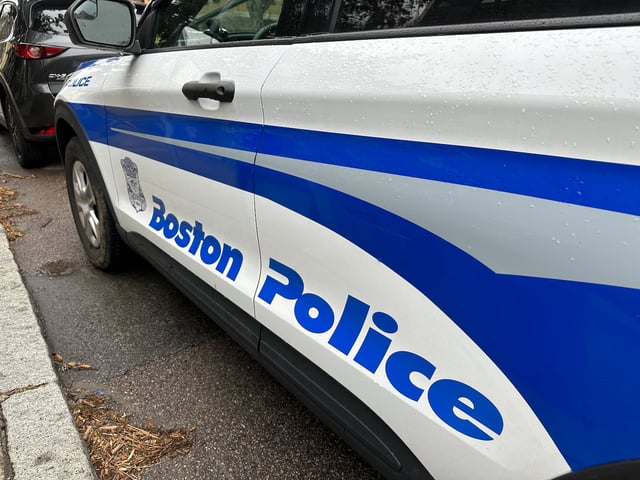 A Boston Police Department cruiser is parked on Green Street in Boston.