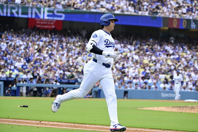LOS ANGELES, CALIFORNIA - SEPTEMBER 21: Shohei Ohtani #17 of the Los Angeles Dodgers runs to first on a single against the San Francisco Giants in the sixth inning at Dodger Stadium on September 21, 2025 in Los Angeles, California.