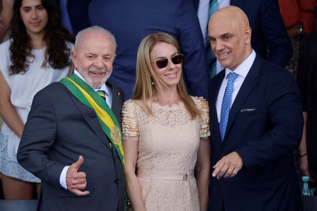 Brazil's President Luiz Inacio Lula da Silva poses for a picture with Brazil's Supreme Court Judge Alexandre de Moraes and his wife Viviane Barci de Moraes during the Independence Day parade in Brasilia, Brazil September 7, 2024. REUTERS/Adriano Machado/File Photo