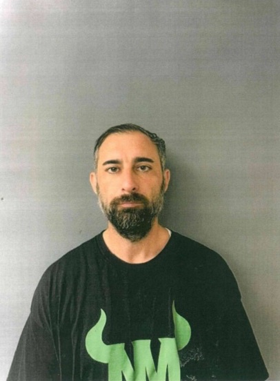 Daniel Fazio faces charges following an incident where police allege he pushed a 7-year-old to the ground during a youth football game. (Courtesy of the New Milford Police Department)