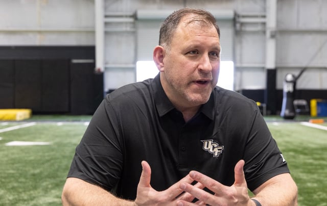 UCF defensive line coach Shawn Clark talks with members of the media during media day in Nicholson Fieldhouse, on the UCF campus in Orlando, Fla., Wednesday, Feb. 12, 2025. (Willie J. Allen Jr./Orlando Sentinel)