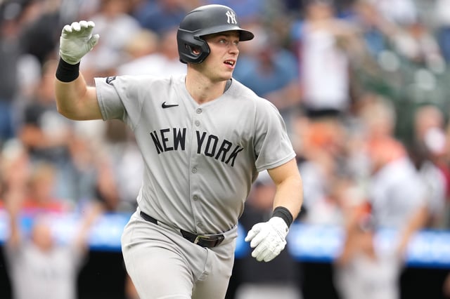 BALTIMORE, MD - SEPTEMBER 21: Ben Rice #22 of the New York Yankees celebrates hitting a grand slam in the tenth inning during a baseball game against the Baltimore Orioles at Oriole Park at Camden Yards on September 21, 2025 in Baltimore, Maryland. (Photo by Mitchell Layton/Getty Images)