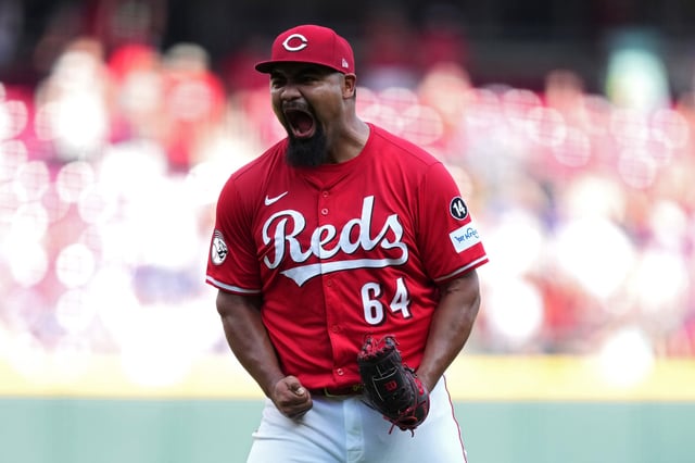 CINCINNATI, OHIO - SEPTEMBER 21: Tony Santillan #64 of the Cincinnati Reds reacts after striking out Pete Crow-Armstrong #4 of the Chicago Cubs during the ninth inning of a baseball game at Great American Ball Park on September 21, 2025 in Cincinnati, Ohio.