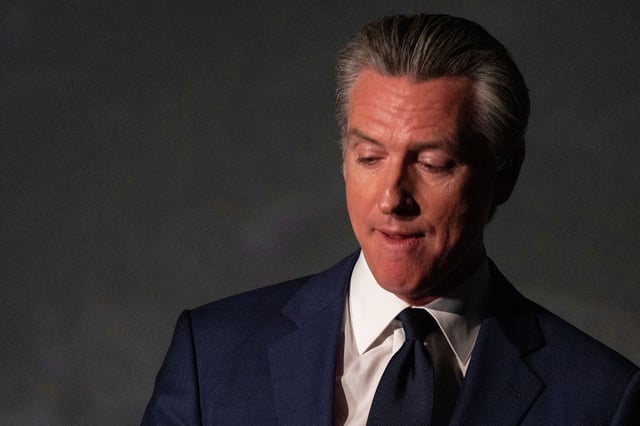 Gov. Gavin Newsom hosts a press conference and signs a slew of climate initiative bills at the California Academy of Sciences on Friday, Sept. 19, 2025, in San Francisco.