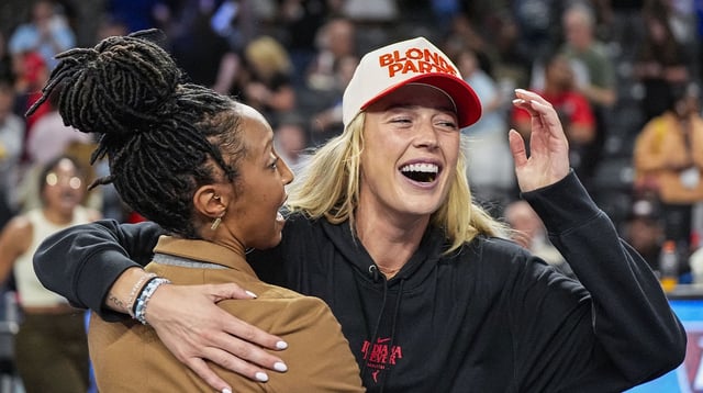 Sep 18, 2025; College Park, Georgia, USA; Indiana Fever player Sophie Cunningham (hat) reacts after The Fever defeated the Atlanta Dream during game three of round one for the 2025 WNBA Playoffs at Gateway Center Arena at College Park. Mandatory Credit: Dale Zanine-Imagn Images.