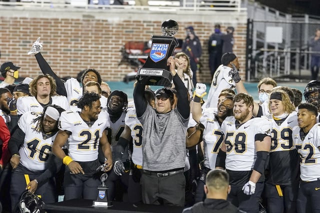 Dec 21, 2020; Conway, SC, USA;Appalachian State Mountaineers head coach Shawn Clark raises the winners trophy for the inaugural Myrtle Beach Bowl at Brooks Stadium. Mandatory Credit: David Yeazell-USA TODAY Sports/File Photo