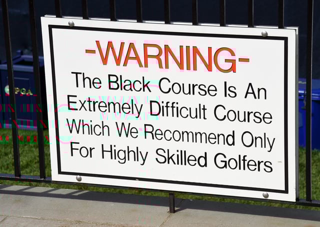 May 15, 2019; Farmingdale, NY, USA; The warning sign outside the clubhouse seen during a practice round for the PGA Championship golf tournament at Bethpage State Park - Black Course. Mandatory Credit: John David Mercer-USA TODAY Sports/File Photo