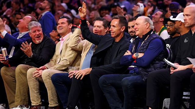 Dec 12, 2023; Phoenix, Arizona, USA; Phoenix Suns former player Steve Nash waves to the crowd during the third quarter of the game between the Phoenix Suns and the Golden State Warriors at Footprint Center. Mandatory Credit: Mark J. Rebilas-Imagn Images
