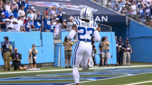 Sep 21, 2025; Nashville, Tennessee, USA; Indianapolis Colts cornerback Kenny Moore II (23) intercepts a pass for a pick six during the first quarter at Nissan Stadium. Mandatory Credit: Steve Roberts-Imagn Images