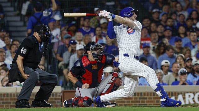 Sep 5, 2025; Chicago, Illinois, USA; Chicago Cubs right fielder Kyle Tucker (30) hits a three-run home run against the Atlanta Braves during the third inning at Wrigley Field. Mandatory Credit: Kamil Krzaczynski-Imagn Images