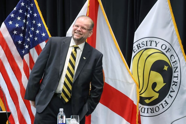 President Alexander Cartwright arrives to announce that the University of Central Florida has been designated a Preeminent State Research University by the Florida Board of Governors, Monday, Sept. 22, 2025. Cartwright made the announcement during a UCF Board of Trustees meeting on campus at the Fairwinds Alumni Center. (Joe Burbank/Orlando Sentinel)